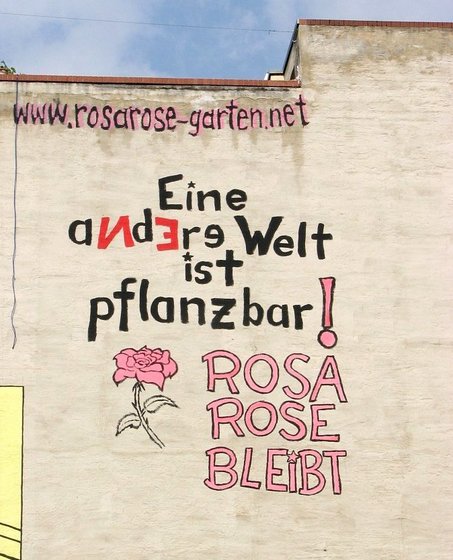 Fassadenmalerei "Eine andere Welt ist pflanzbar!"