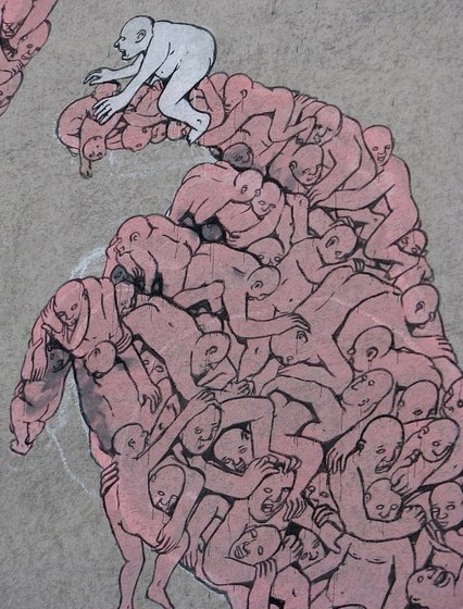 Detailaufnahme einer Hand, die aus lauter Menschen zusammengesetzt ist