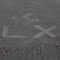 "LX was here" in Sand gemalt
